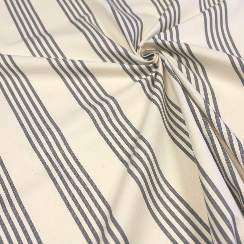 Tissu toile à matelas de coton LE TOUQUET écru aux rayures : bleu, rouge, noir, gris, sable - tissuspipi.com