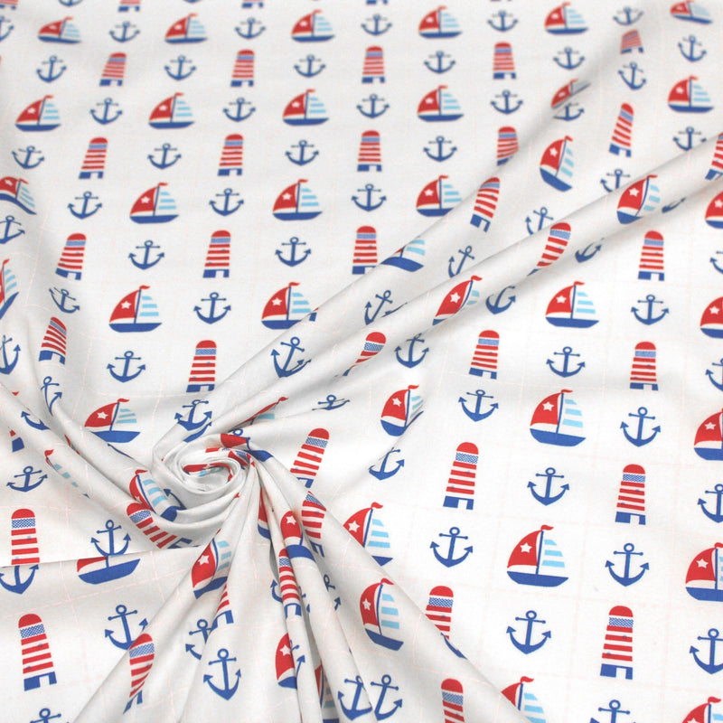 Tissu popeline de coton aux phares, bateaux et ancres de marine, fond blanc - tissuspipi.com