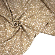 Tissu cotonnade ocre aux fleurs blanches - OEKO - TEX - tissuspipi.com