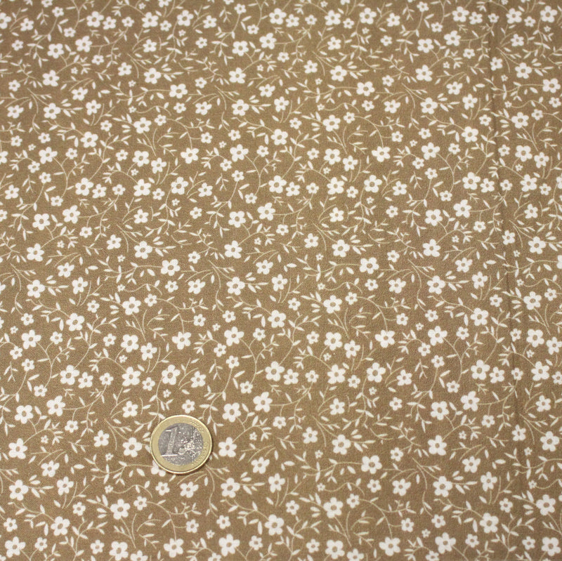 Tissu cotonnade ocre aux fleurs blanches - OEKO - TEX - tissuspipi.com