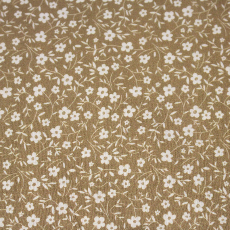 Tissu cotonnade ocre aux fleurs blanches - OEKO - TEX - tissuspipi.com