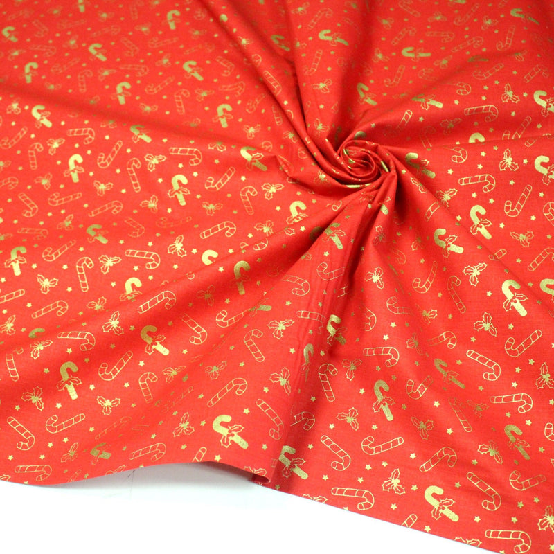 Tissu coton NOËL rouge aux houx et sucres d'orge dorés - OEKO - TEX - tissuspipi.com