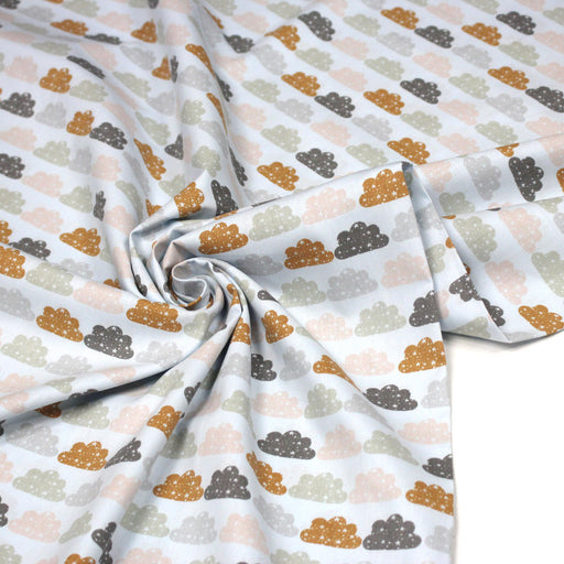 Tissu popeline coton rose bleu ciel aux nuages roses, gris et ocres - tissuspipi.com
