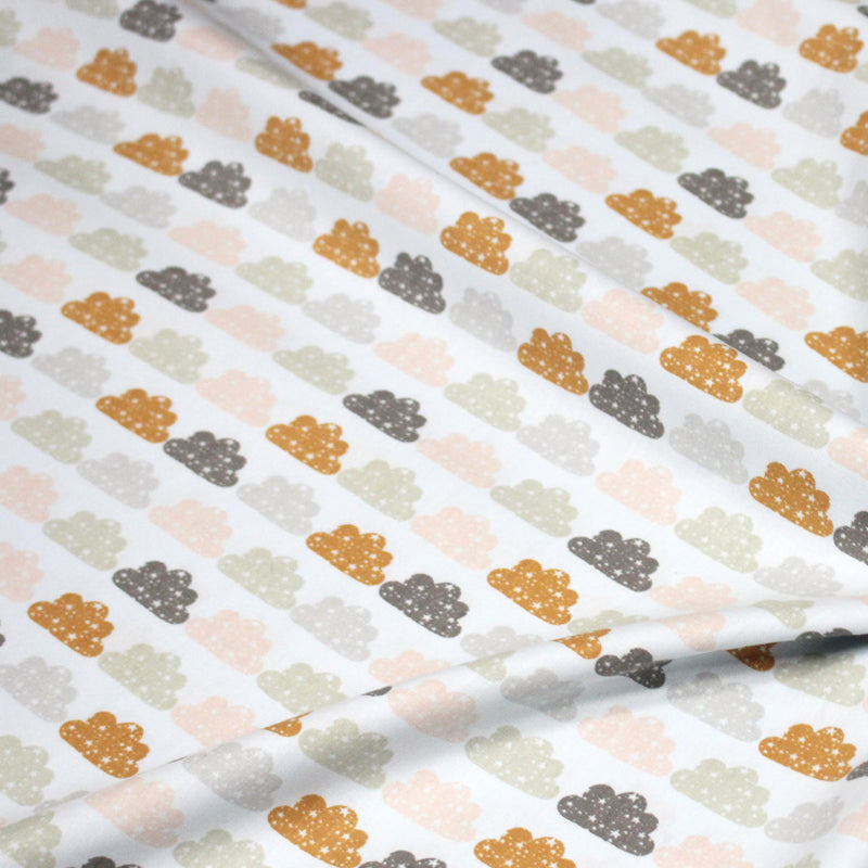 Tissu popeline coton rose bleu ciel aux nuages roses, gris et ocres - tissuspipi.com