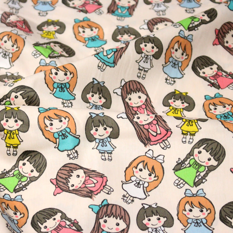 Tissu popeline coton aux petits filles façon bande dessinée - tissuspipi.com