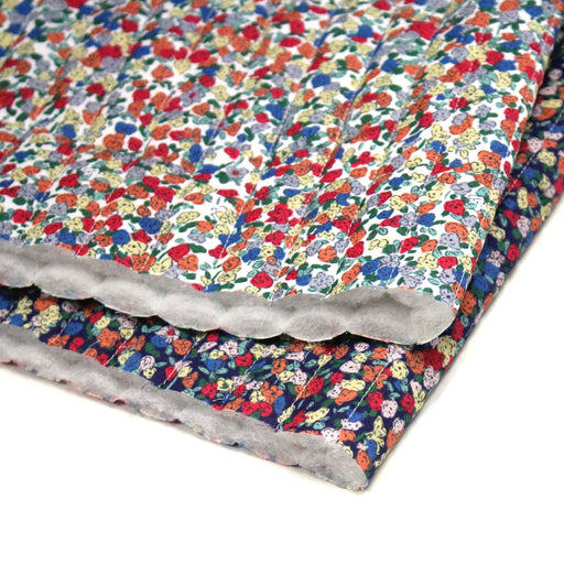 Tissu matelassé FLEURI fines fleurs : fond bleu ou fond blanc - OEKO - TEX - tissuspipi.com