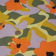 Tissu Viscose fluide AIMEE aux fleurs graphiques vertes, oranges et mauves - OEKO - TEX STANDARD 100 - tissuspipi.com