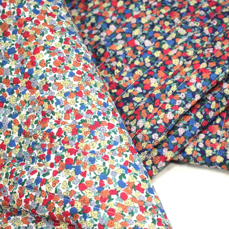 Tissu matelassé FLEURI fines fleurs : fond bleu ou fond blanc - OEKO - TEX - tissuspipi.com
