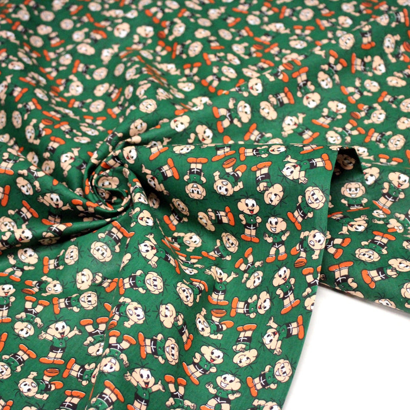 Tissu popeline coton vert au petit bonhomme, façon BD - tissuspipi.com