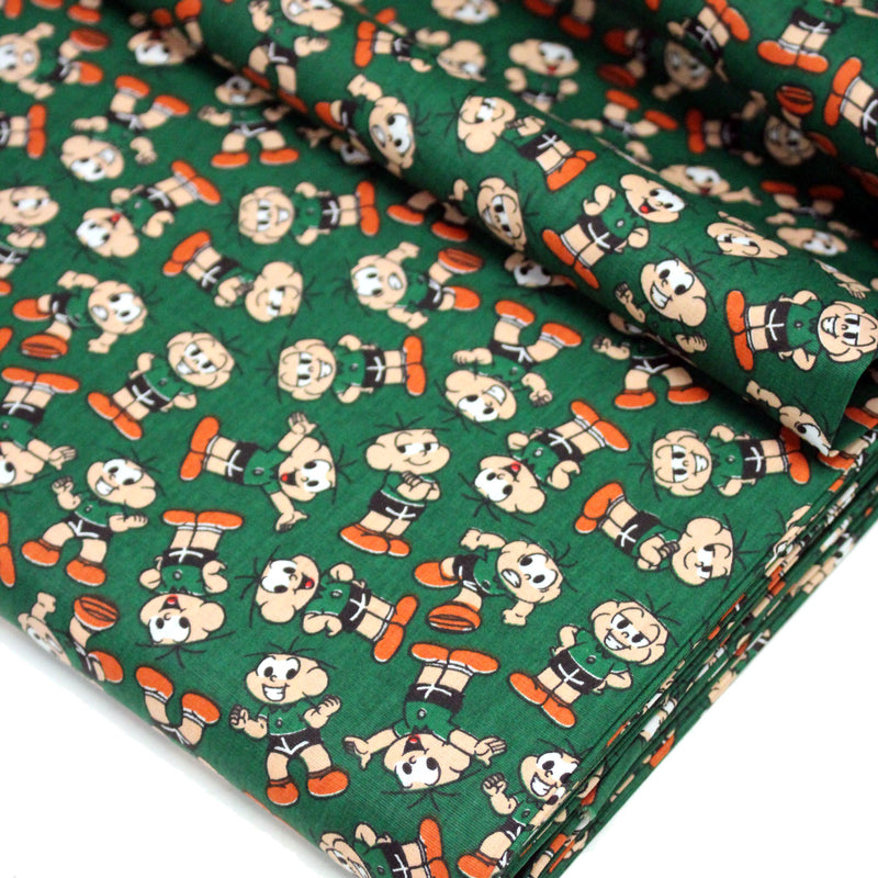 Tissu popeline coton vert au petit bonhomme, façon BD - tissuspipi.com