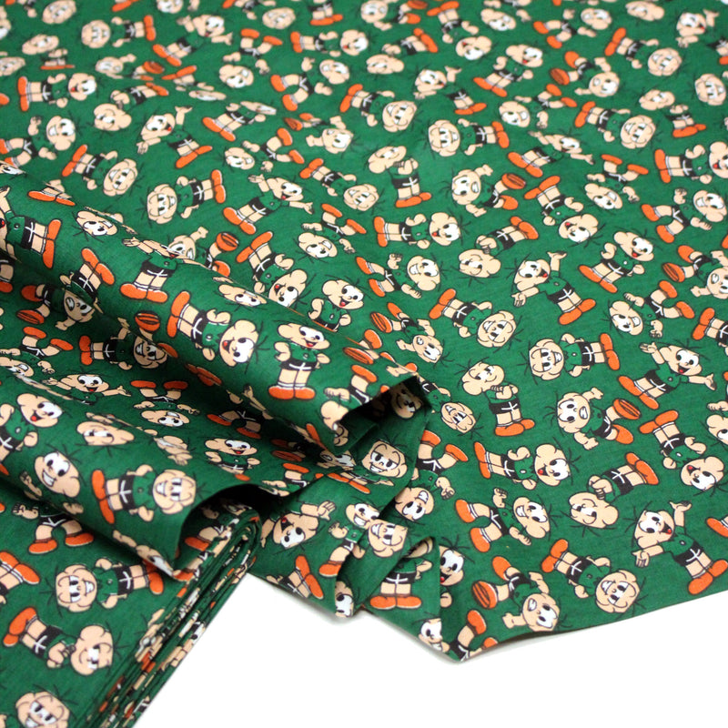 Tissu popeline coton vert au petit bonhomme, façon BD - tissuspipi.com