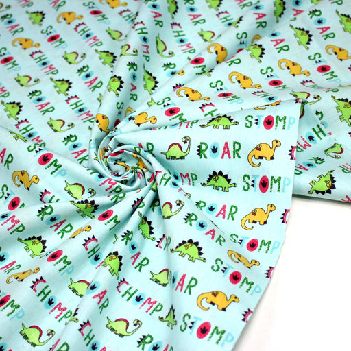 Tissu popeline coton DINO ROAR, bleu aux motifs dinosaures multicolores - tissuspipi.com