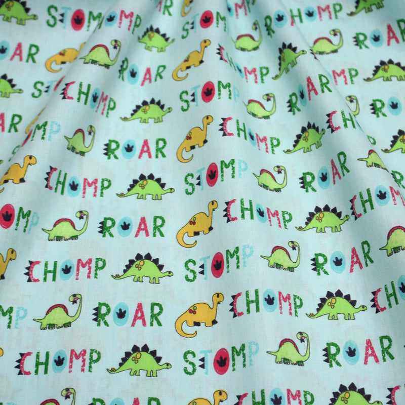 Tissu popeline coton DINO ROAR, bleu aux motifs dinosaures multicolores - tissuspipi.com
