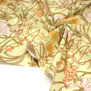Tissu cotonnade VICTOR au feuillage ART NOUVEAU multicolore, fond vert anis - OEKO - TEX STANDARD 100 - tissuspipi.com