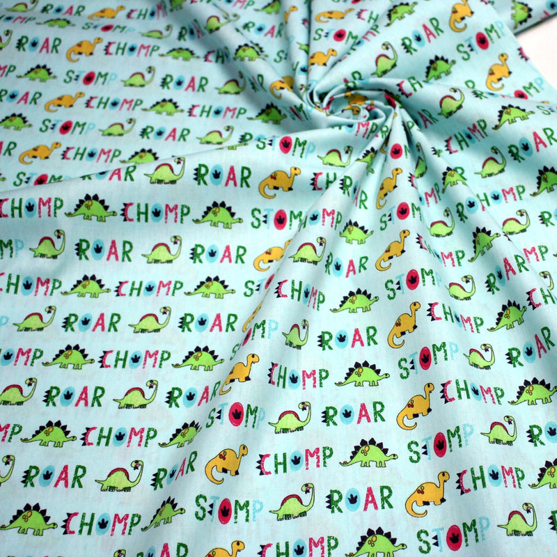 Tissu popeline coton DINO ROAR, bleu aux motifs dinosaures multicolores - tissuspipi.com