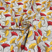 Tissu cotonnade motif WAX floral, fleurs rouges et jaunes - OEKO - TEX STANDARD 100 - tissuspipi.com
