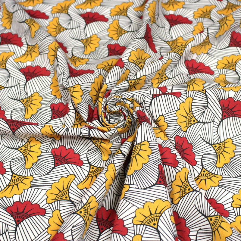 Tissu cotonnade motif WAX floral, fleurs rouges et jaunes - OEKO - TEX STANDARD 100 - tissuspipi.com
