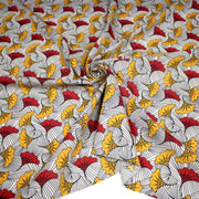 Tissu cotonnade motif WAX floral, fleurs rouges et jaunes - OEKO - TEX STANDARD 100 - tissuspipi.com