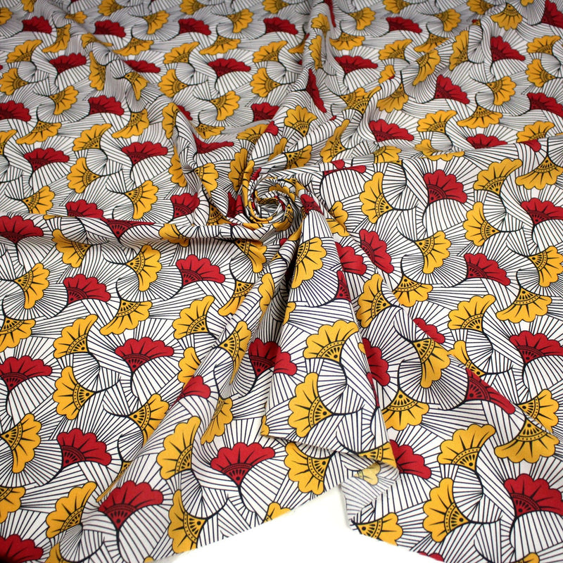 Tissu cotonnade motif WAX floral, fleurs rouges et jaunes - OEKO - TEX STANDARD 100 - tissuspipi.com