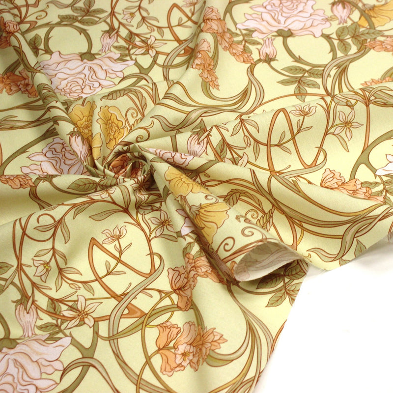Tissu cotonnade VICTOR au feuillage ART NOUVEAU multicolore, fond vert anis - OEKO - TEX STANDARD 100 - tissuspipi.com