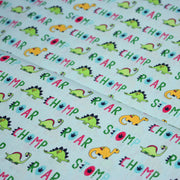 Tissu popeline coton DINO ROAR, bleu aux motifs dinosaures multicolores - tissuspipi.com