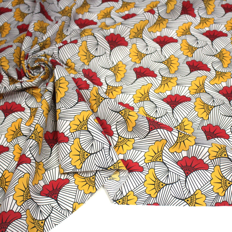 Tissu cotonnade motif WAX floral, fleurs rouges et jaunes - OEKO - TEX STANDARD 100 - tissuspipi.com