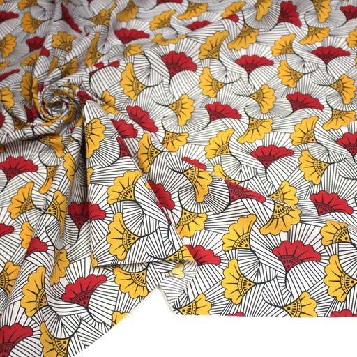 Tissu cotonnade motif WAX floral, fleurs rouges et jaunes - OEKO - TEX STANDARD 100 - tissuspipi.com