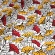 Tissu cotonnade motif WAX floral, fleurs rouges et jaunes - OEKO - TEX STANDARD 100 - tissuspipi.com