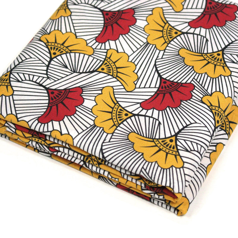 Tissu cotonnade motif WAX floral, fleurs rouges et jaunes - OEKO - TEX STANDARD 100 - tissuspipi.com