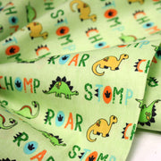 Tissu popeline coton DINO ROAR, vert aux motifs dinosaures multicolores - tissuspipi.com
