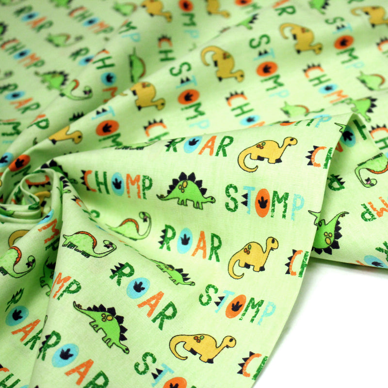 Tissu popeline coton DINO ROAR, vert aux motifs dinosaures multicolores - tissuspipi.com