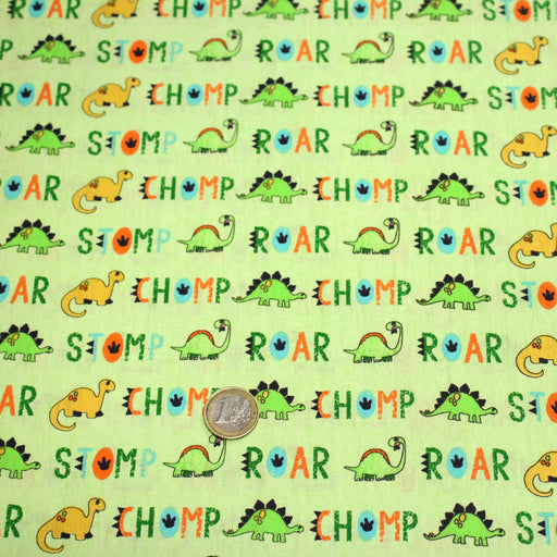 Tissu popeline coton DINO ROAR, vert aux motifs dinosaures multicolores - tissuspipi.com