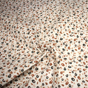 Tissu matelassé LEOPARD, écru et taches léopard noires, roses, ocres - OEKO - TEX - tissuspipi.com