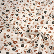 Tissu matelassé LEOPARD, écru et taches léopard noires, roses, ocres - OEKO - TEX - tissuspipi.com