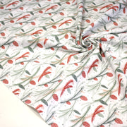Tissu coton NOËL blanc aux branches sapins et pommes de pin rouges - OEKO - TEX - tissuspipi.com