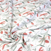 Tissu coton NOËL blanc aux branches sapins et pommes de pin rouges - OEKO - TEX - tissuspipi.com