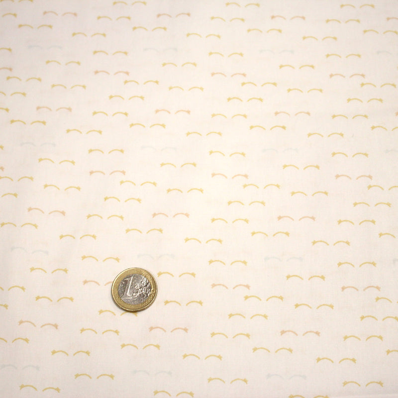Tissu popeline coton les étoiles filantes jaunes, fond blanc - tissuspipi.com