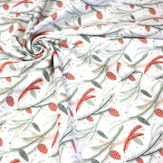 Tissu coton NOËL blanc aux branches sapins et pommes de pin rouges - OEKO - TEX - tissuspipi.com