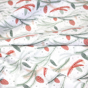 Tissu coton NOËL blanc aux branches sapins et pommes de pin rouges - OEKO - TEX - tissuspipi.com