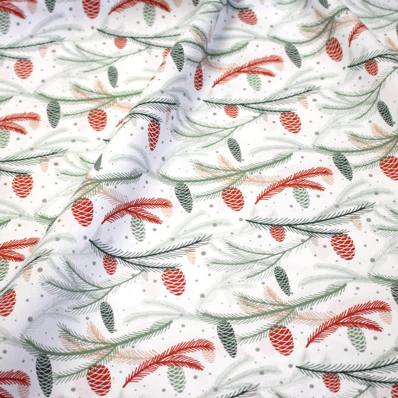 Tissu coton NOËL blanc aux branches sapins et pommes de pin rouges - OEKO - TEX - tissuspipi.com