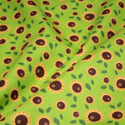 Tissu popeline coton vert aux tournesols jaunes & feuilles vertes - tissuspipi.com