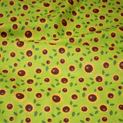 Tissu popeline coton vert aux tournesols jaunes & feuilles vertes - tissuspipi.com