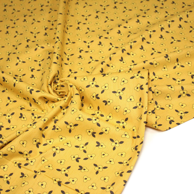 Tissu popeline coton jaune aux fleurs graphiques jaunes - tissuspipi.com