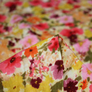 Tissu double gaze imprimée fleuri rose et jaune - OEKO - TEX STANDARD 100 - tissuspipi.com