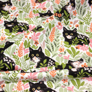 Tissu cotonnade aux chats dans les fleurs roses et vertes - OEKO - TEX STANDARD 100 - tissuspipi.com