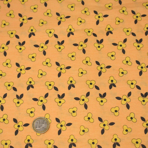 Tissu popeline coton corail aux fleurs graphiques jaunes - tissuspipi.com