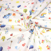 Tissu cotonnade aux DESSINS D'ENFANT multicolores, fond blanc - tissuspipi.com