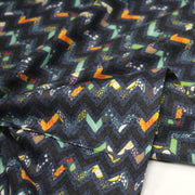 Tissu popeline coton zig zag bleu, noir et fines fleurs multicolores - tissuspipi.com