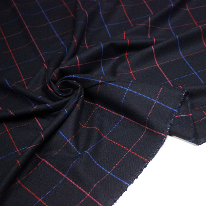 Tissu draperie lainage bleu nuit motif windowpane aux liserés roses rouges et bleu roi - tissuspipi.com