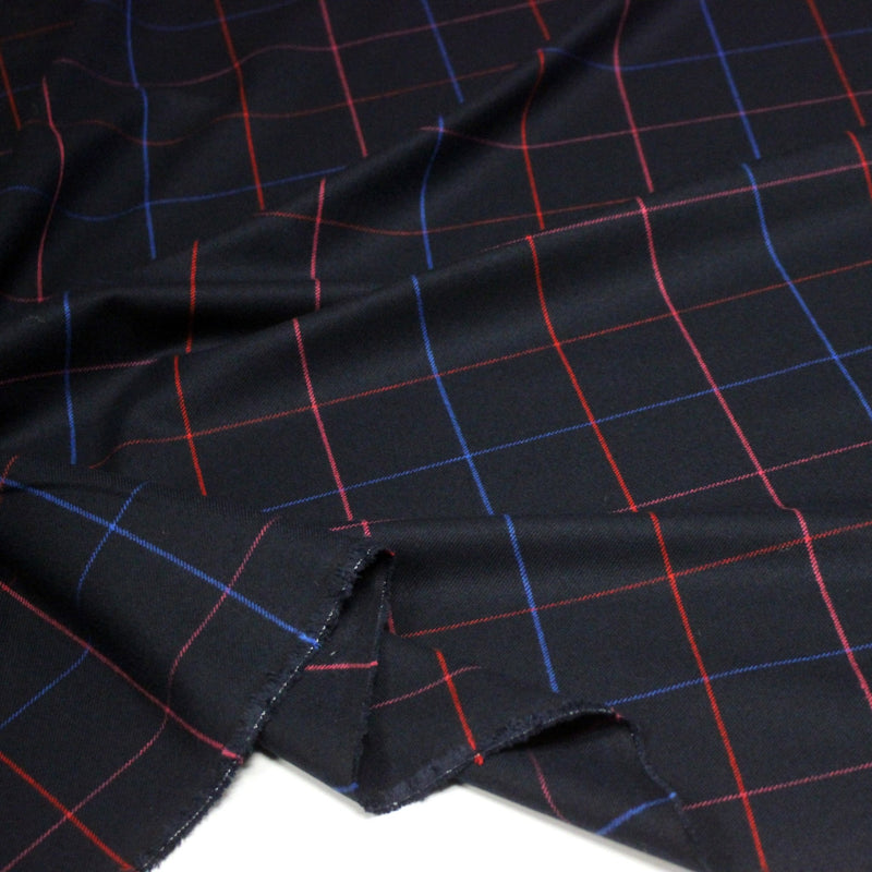 Tissu draperie lainage bleu nuit motif windowpane aux liserés roses rouges et bleu roi - tissuspipi.com